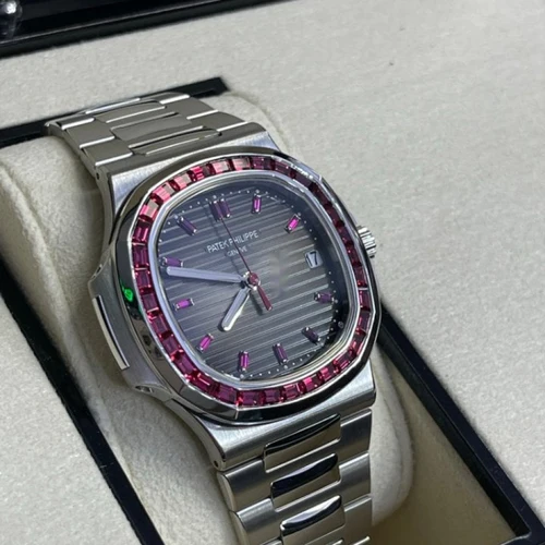 Patek Philippe Nautilus 5711/112P-010 Platinum Nautilus with Ruby Diamonds Unworn - Image 2