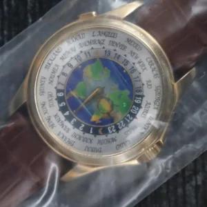 Patek Philippe World Time M38401 18k Yellow Gold World Time Ref. 5131J-001 Unworn Sealed 2010 Full Set
